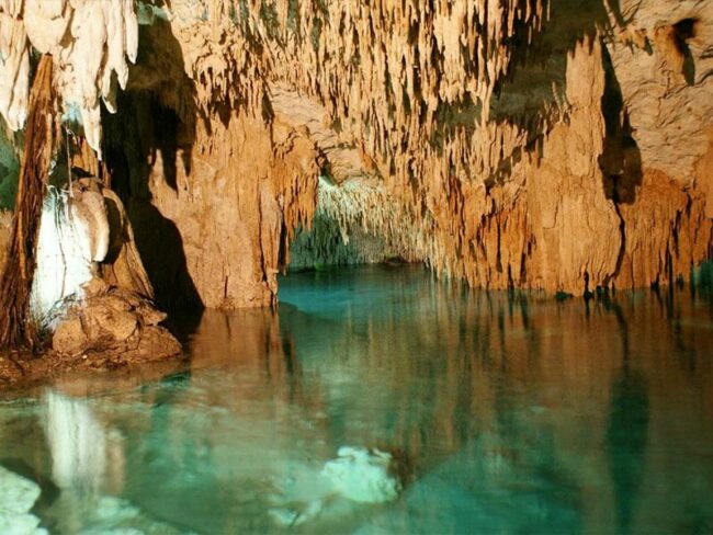 Explore the best private cenote with crystal clear turquoise waters and a magical scenery at our Full Day Coba Mayan Ruins and ATV Tour