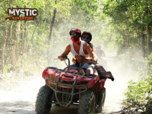 Choose between a double or a single ATV quad bike and have a thrilling experience driving on a rustic road in the middle of the jungle at the Tulum Tours from Riviera Maya