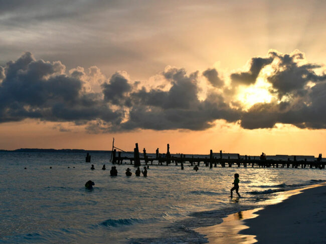 Catch Cancun's most amazing sunsets while being on the beach here at the half day sail cat