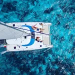 Have a relaxing time under the sun while experiencing this beautiful turquoise blue sea sailing on our Full Day Sail Cat 30 Guests to Isla Mujeres Tour
