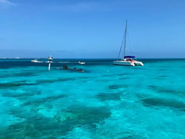 In our Sail Cat 30 Guests Full Day tour to Isla Mujeres, we will go wreck snorkelling in crystal clear waters on a family friendly adventure