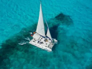 A fun way to travel from Cancun to Isla Mujeres is sailing on a Private Catamaran that offers multiple fun activities to experience with family and friends. You will find that in this Sail Cat 30 Guests Full Day trip