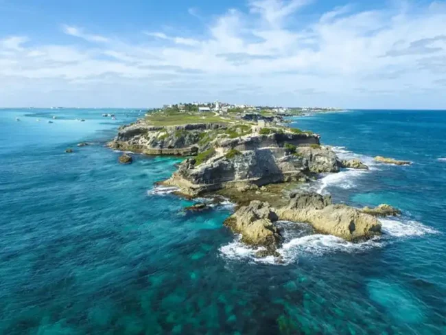 Discover the breathless views from South Point at our Private Sail Cat 30 Guests Full Day trip to Isla Mujeres