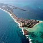 Have fun exploring the crystal-clear waters of the Caribbean Sea on a private catamaran sailing tour to Isla Mujeres