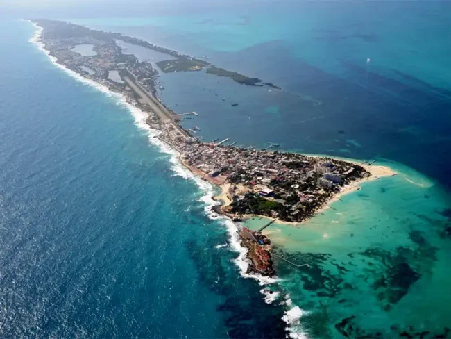 Have fun exploring the crystal-clear waters of the Caribbean Sea on a private catamaran sailing tour to Isla Mujeres