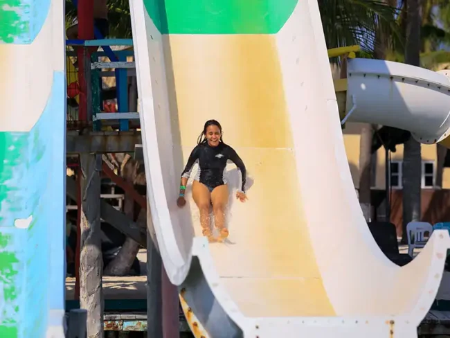 Have an amazing time getting on different types of water slides on our private catamaran sailing tour in Isla Mujeres.