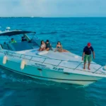 Boat ride through the Caribbean sea with turquoise waters / Yacht in Cancun 15 Passengers